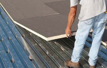 benefits of insulating Pedair Ffordd flat roofing